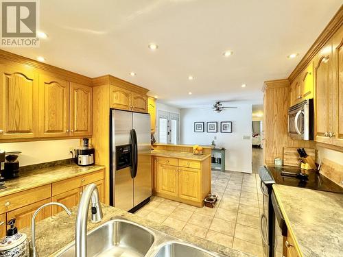 6476 Messner Road, Horse Lake, BC - Indoor Photo Showing Kitchen With Double Sink