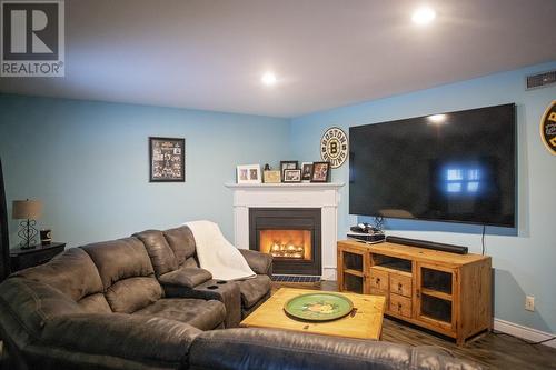 54 Raynham Street, Gander, NL - Indoor Photo Showing Living Room With Fireplace