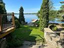 Vue sur l'eau - 661 Ch. Du Lac-Connelly, Saint-Hippolyte, QC  - Outdoor With Body Of Water With View 
