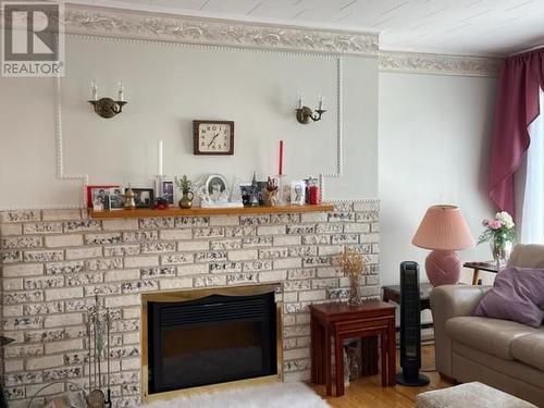 6 O'Briens Drive, Stephenville, NL - Indoor Photo Showing Living Room With Fireplace