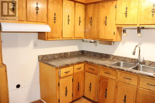 28 Pleasant Street, Stephenville Crossing, NL - Indoor Photo Showing Kitchen With Double Sink