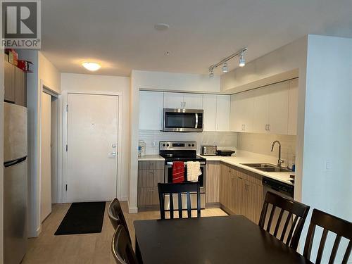 695 Academy Way Unit# 207, Kelowna, BC - Indoor Photo Showing Kitchen With Double Sink