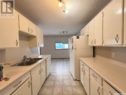 9045 Panton Avenue, North Battleford, SK - Indoor Photo Showing Kitchen With Double Sink