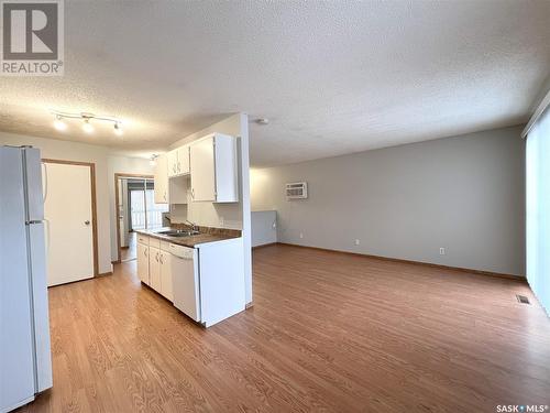 9045 Panton Avenue, North Battleford, SK - Indoor Photo Showing Kitchen With Double Sink