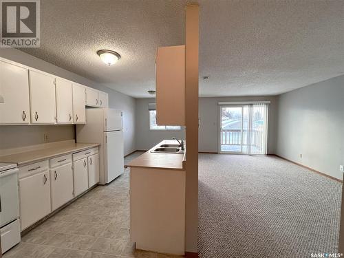 9043 Panton Avenue, North Battleford, SK - Indoor Photo Showing Kitchen With Double Sink