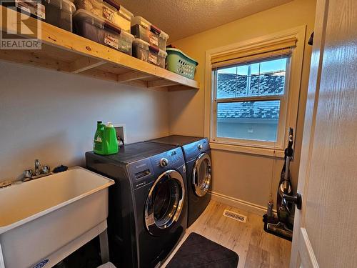 5306 49 Street, Pouce Coupe, BC - Indoor Photo Showing Laundry Room