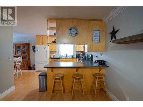 8703-8707 89 Avenue, Fort St. John, BC - Indoor Photo Showing Kitchen