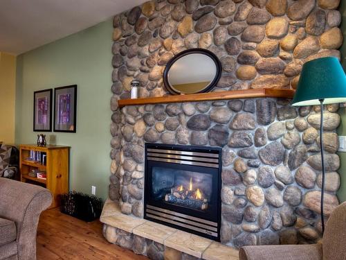 21-250 Strayhorse Road, Apex Mountain, BC - Indoor Photo Showing Living Room With Fireplace