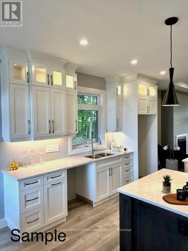 7 Mackenzie John Cres, Brighton, ON - Indoor Photo Showing Kitchen With Double Sink