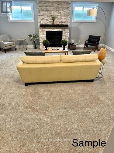 7 Mackenzie John Cres, Brighton, ON - Indoor Photo Showing Living Room With Fireplace