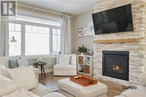 21 Mackenzie John Crescent, Brighton, ON - Indoor Photo Showing Living Room With Fireplace