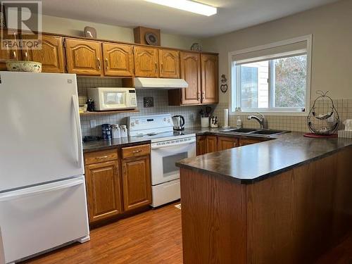 6840 89Th Street Unit# 206, Osoyoos, BC - Indoor Photo Showing Kitchen With Double Sink