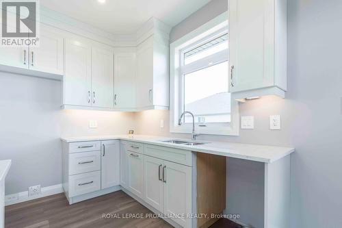 31 Mackenzie John Crescent, Brighton, ON - Indoor Photo Showing Kitchen With Double Sink