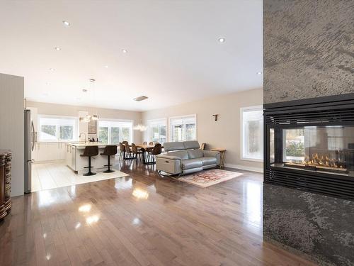 Vue d'ensemble - 89 Rue De L'Oiselet, Saint-Colomban, QC - Indoor Photo Showing Living Room With Fireplace