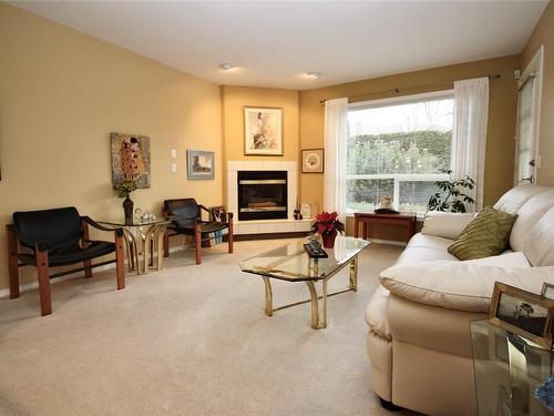 3-625 Barrera Road, Kelowna, BC - Indoor Photo Showing Living Room With Fireplace