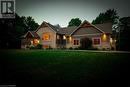 Embrace modern elegance: a stunning bungalow with stone and timber frame, where timeless charm meets contemporary luxury. - 3 Teddy Bear Lane, South Bruce Peninsula, ON  - Outdoor With Facade 