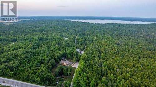 While nestled in a serene natural setting, Berford Lake is still within convenient reach of essential amenities and services. The charming town of Wiarton offers a range of shops, restaurants, recreat - 3 Teddy Bear Lane, South Bruce Peninsula, ON - Outdoor With Body Of Water With View