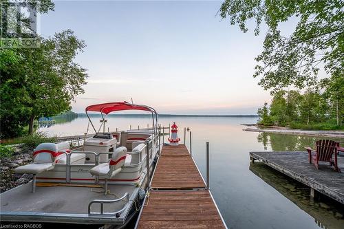 Set upon a sprawling 50-acre estate nestled near the breathtaking shores of Berford Lake. Dock on Berford Lake accessed via Right of Way. - 3 Teddy Bear Lane, South Bruce Peninsula, ON - Outdoor With Body Of Water With View