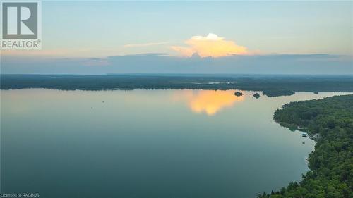 The Bruce Peninsula is a year-round haven for outdoor enthusiasts, and Berford Lake is your gateway to a wealth of recreational activities. With a property like this, the possibilities for outdoor exp - 3 Teddy Bear Lane, South Bruce Peninsula, ON - Outdoor With Body Of Water With View