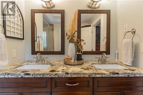 Rich custom Mennonite vanity in the primary ensuite offering his and her sinks. - 3 Teddy Bear Lane, South Bruce Peninsula, ON - Indoor Photo Showing Bathroom