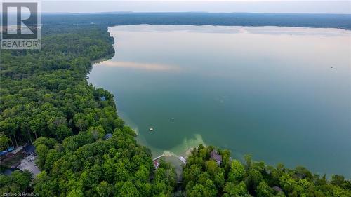 Berford Lake provides an ideal retreat from the fast-paced urban lifestyle. Experience the joy of a more relaxed and laid-back atmosphere, where time seems to slow down, allowing you to fully apprecia - 3 Teddy Bear Lane, South Bruce Peninsula, ON - Outdoor With Body Of Water With View