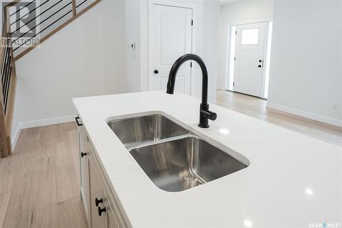 1308 14Th Street E, Saskatoon, SK - Indoor Photo Showing Kitchen With Double Sink