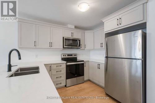 58 Whitcomb Cres, Smiths Falls, ON - Indoor Photo Showing Kitchen With Double Sink