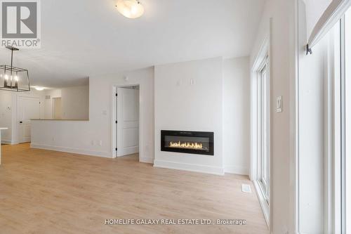 58 Whitcomb Cres, Smiths Falls, ON - Indoor Photo Showing Other Room With Fireplace