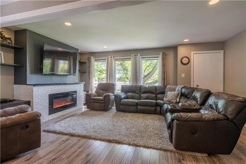 857 Main Street, Steinbach, MB - Indoor Photo Showing Living Room With Fireplace