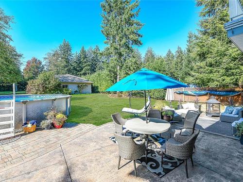 5069 Mitchell Rd, Courtenay, BC - Outdoor With Above Ground Pool With Deck Patio Veranda With Backyard
