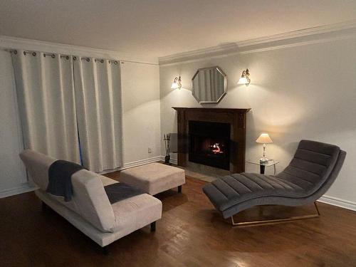 Salon - 24 Rue Des Bolets, Blainville, QC - Indoor Photo Showing Living Room With Fireplace