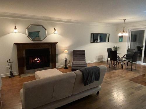 Salon - 24 Rue Des Bolets, Blainville, QC - Indoor Photo Showing Living Room With Fireplace