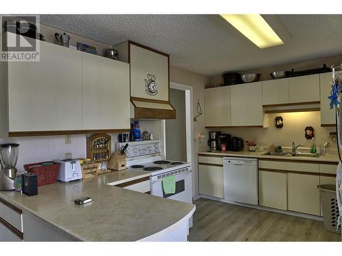 14 Ochwe Street, Kitimat, BC - Indoor Photo Showing Kitchen With Double Sink