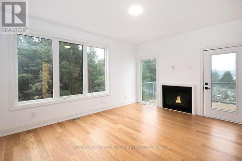 23 Waterview Lane, Blue Mountains, ON - Indoor Photo Showing Living Room With Fireplace