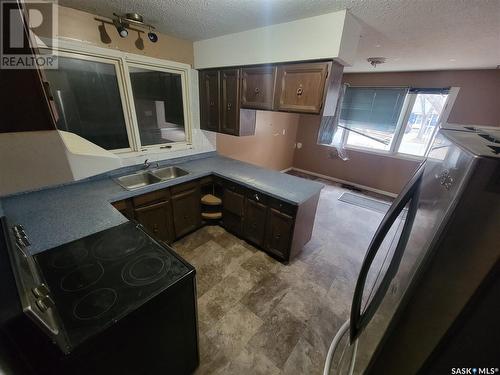 1152 108Th Street, North Battleford, SK - Indoor Photo Showing Kitchen With Double Sink