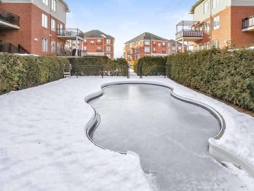 Piscine - 2-8750 Crois. Du Louvre, Brossard, QC - Outdoor With In Ground Pool With Balcony