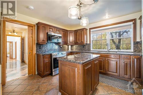 145 Manor Way, Rideau Ferry, ON - Indoor Photo Showing Kitchen With Double Sink