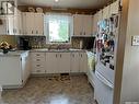 106 2Nd Avenue E, Lampman, SK  - Indoor Photo Showing Kitchen With Double Sink 