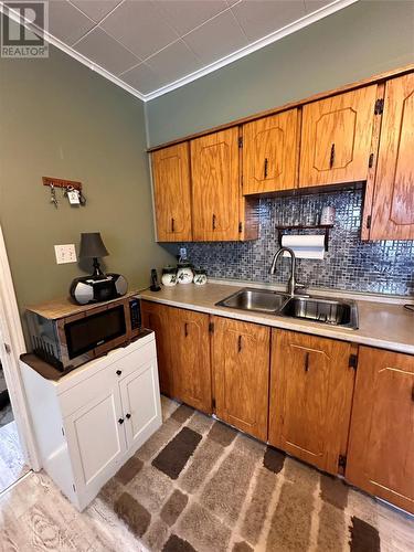 271 Main Street, Burin Bay Arm, NL - Indoor Photo Showing Kitchen With Double Sink
