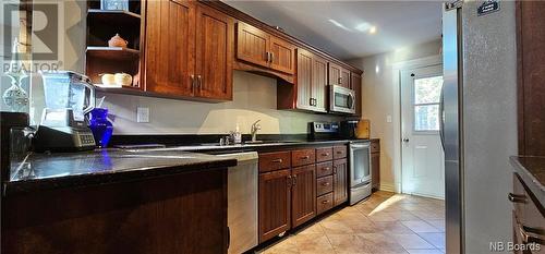 27 Woodland Road, Pennfield, NB - Indoor Photo Showing Kitchen With Double Sink