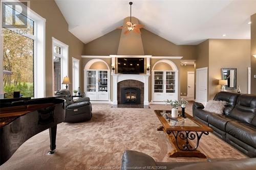 10989 River Line, Chatham-Kent, ON - Indoor Photo Showing Living Room With Fireplace