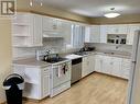 5411 W 54 Avenue, Fort Nelson, BC  - Indoor Photo Showing Kitchen With Double Sink 