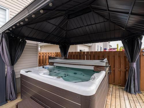 Hot tub - 107 Rue Des Pruches, Vaudreuil-Dorion, QC - Outdoor With Deck Patio Veranda With Exterior
