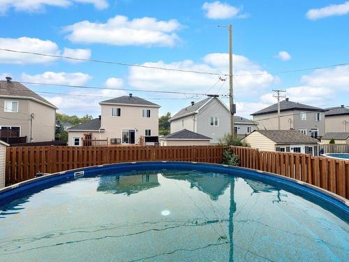 Pool - 107 Rue Des Pruches, Vaudreuil-Dorion, QC - Outdoor With Above Ground Pool With Backyard