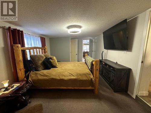 5264 43 Street, Fort Nelson, BC - Indoor Photo Showing Bedroom