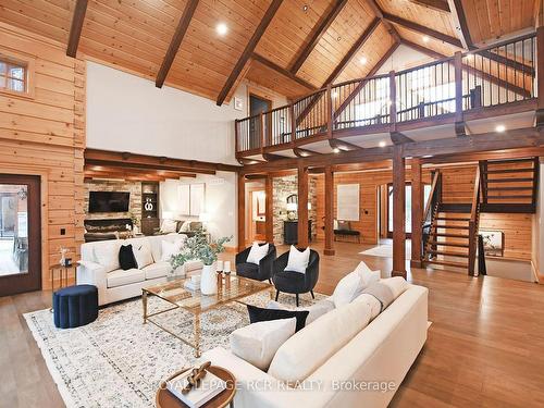 27440 Cedarhurst Beach Rd, Brock, ON - Indoor Photo Showing Living Room With Fireplace