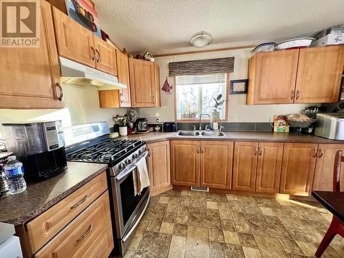 4420 Moe Road, Burns Lake, BC - Indoor Photo Showing Kitchen With Double Sink