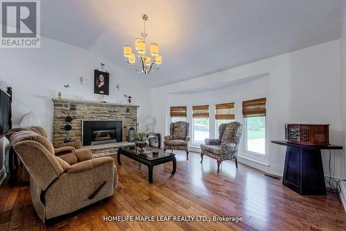 33 Maplewood Dr, Amaranth, ON - Indoor Photo Showing Living Room With Fireplace
