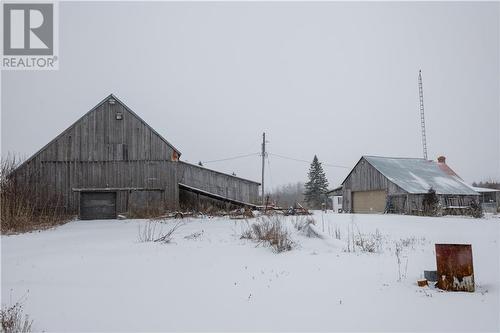 Rear view of barn showing location to garage. - 18711 Beaver Brook Road, Martintown, ON 