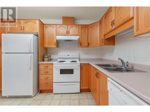 2255 Atkinson Street Unit# 104, Penticton, BC - Indoor Photo Showing Kitchen With Double Sink